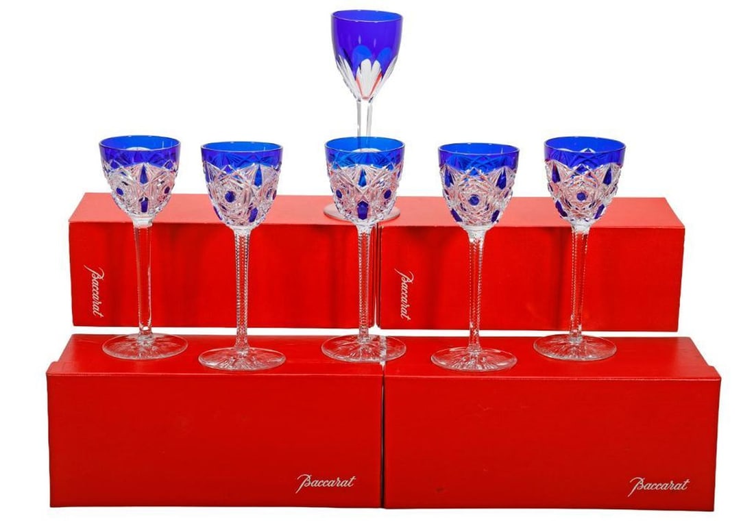 Six Baccarat Lagny Cobalt Blue Cut to Clear Wine Glasses: Each 7.75"h. Four with the original red Baccarat retail boxes. {Overall good condition}. [Provenance: Estate of Joan A. Nitis, San Francisco.]