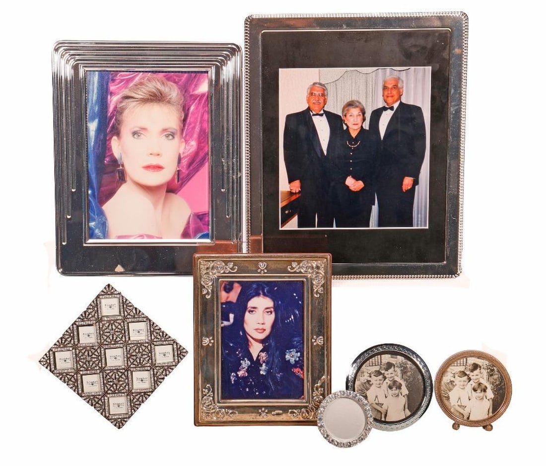 Lot Rhinestone Studded, Sterling or Silverplated Pictures Frames: Comprising an English sterling hallmarked frame 7" x 5.5"; (2) circular sterling mounted frames, the larger 3.5"d; (2) rhinestone encrusted frames, the larger by Bombay 4.25" square; (2) plated frames