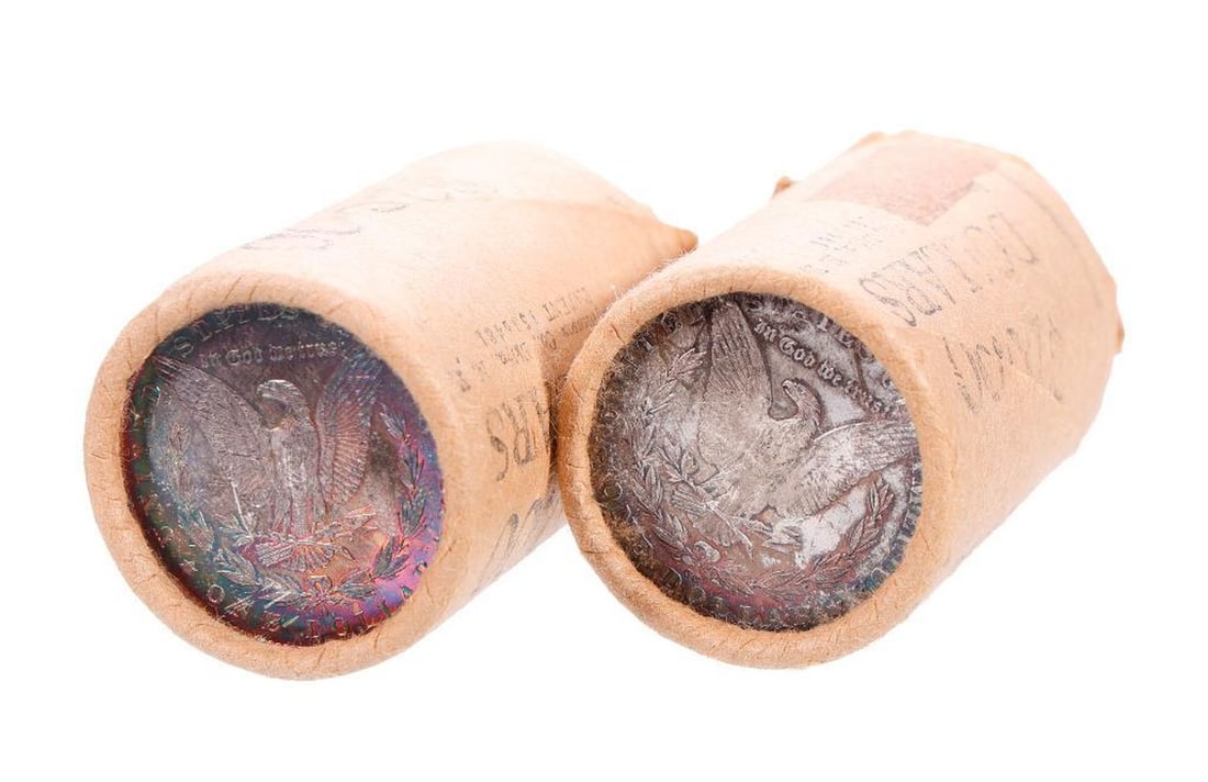 Two $20 Rolls Morgan Silver Dollars: Mixed dates including top coin 1880-o AU, total weight 1049 grams [Provenance: Estate of Joan A. Nitis, San Francisco.]