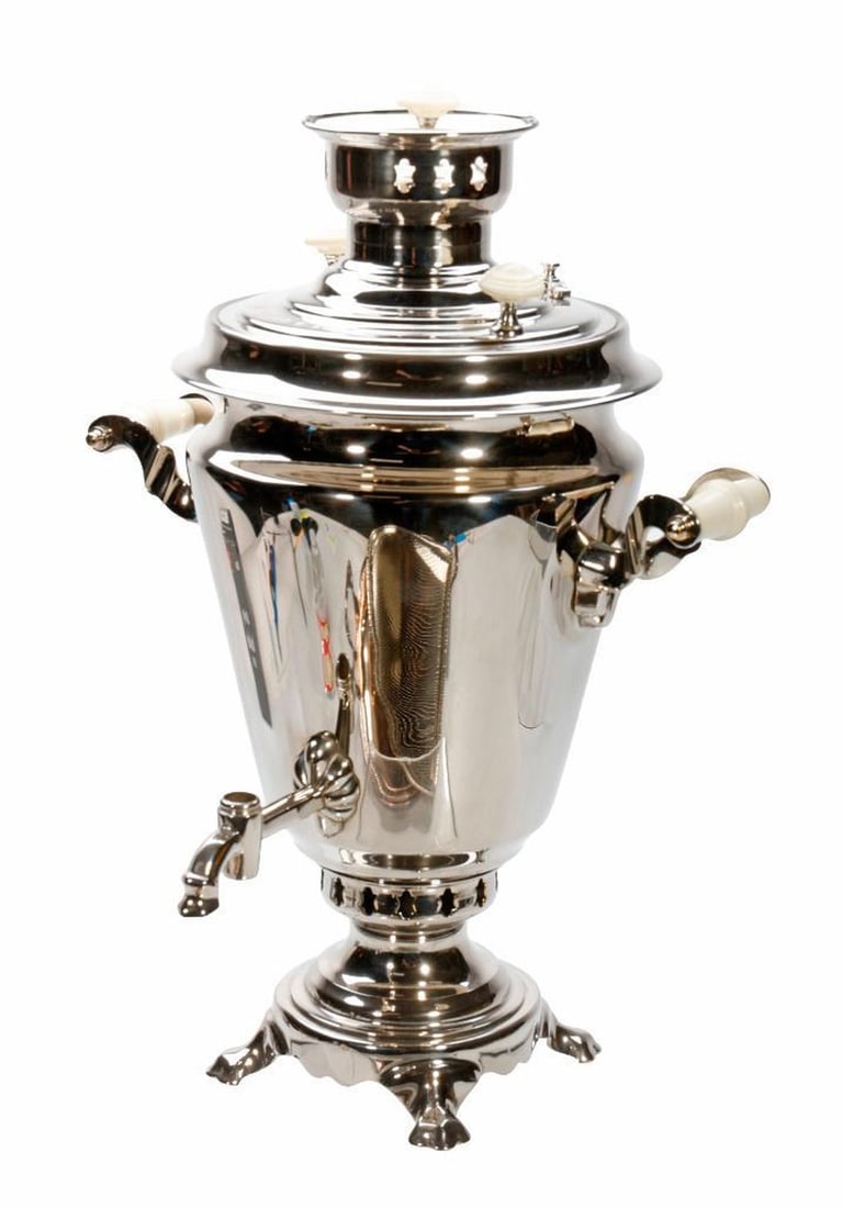 Vintage Stainless Steel Samovar, with Two Trays: A tapered form stainless steel samovar with faux bone handles, on footed base, 19" x 14" x 12" (PLEASE NOTE: Missing spigot lever). Together with: a handled oval tray, 21" x 12"; and a rounded-end rec