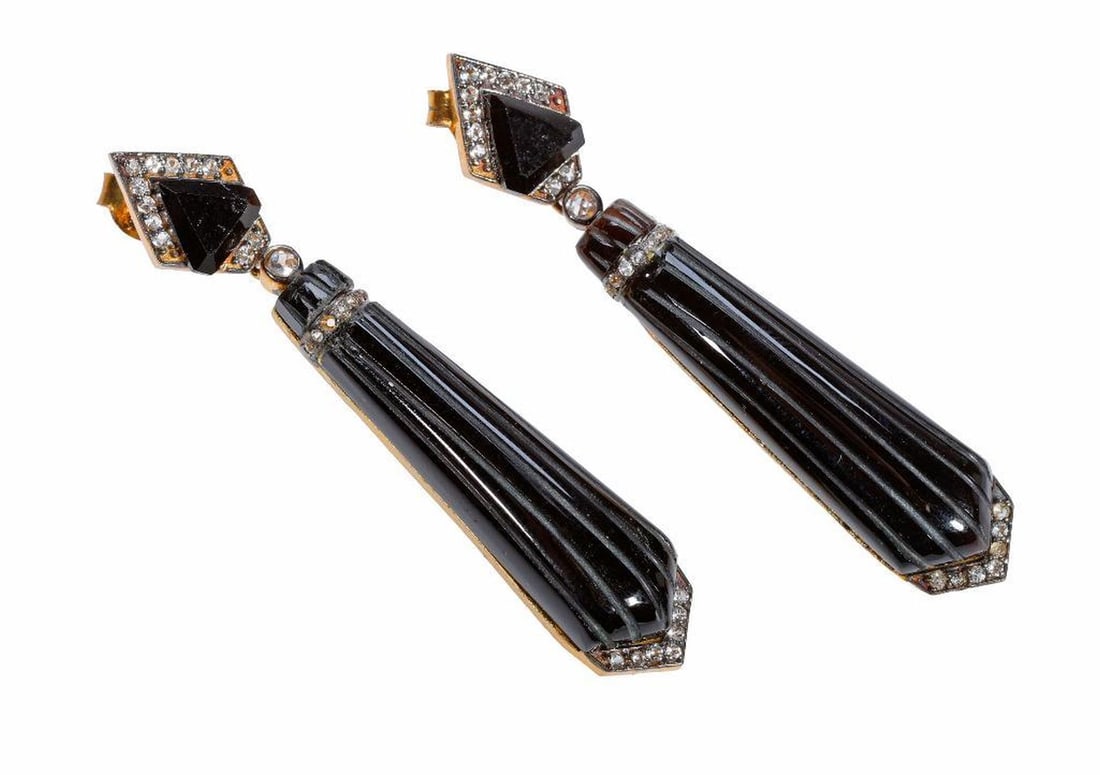 A pair of onyx and white topaz pendant earrings: set in vermeil silver; weighing approximately 9.6 grams; length: 2 in.