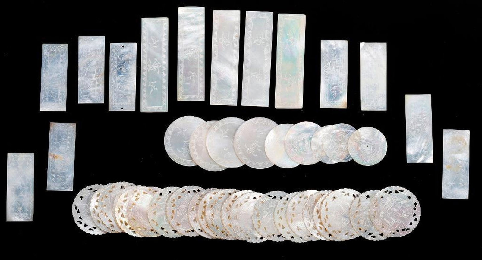 Collection of mother-of-pearl Chinese gaming tokens (1 of 2)