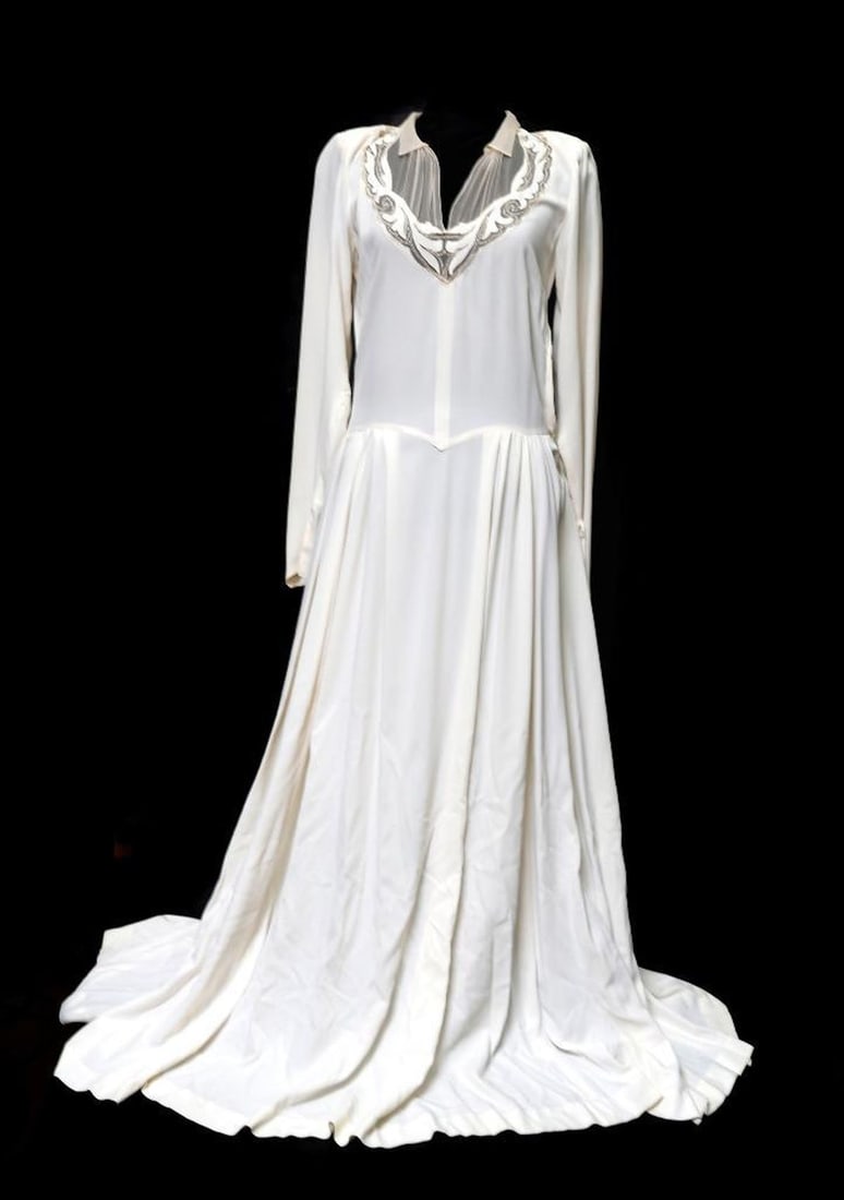 Vintage Ivory Crepe Wedding Dress, 1940s: A custom 1940s ivory crepe wedding dress with open scallop and netting work at neckline. Approx. Size Small/6. Approx. flat measurements: shoulders 15"; waist 14"; length at front (from back of collar