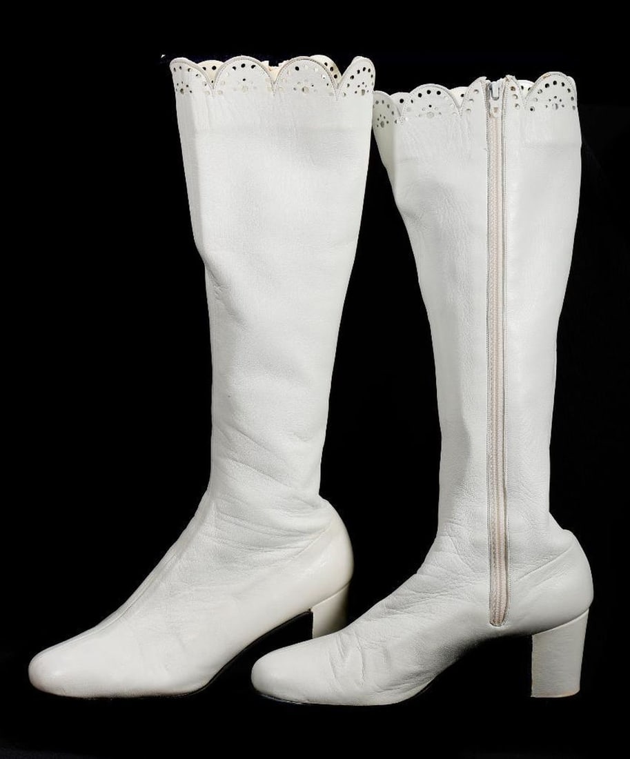 Vintage White Leather Go-Go Boots (Sz 6B): A pair of circa 1960s-1970s white leather boots with scalloped and perforated tops; heel height 2 1/2"; shaft height approx. 12"; top of shaft circumference approx. 12"; width approx. 3"; no maker. Ha