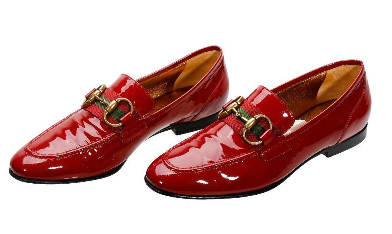 Vintage Gucci Red Patent Leather Loafers (Sz 7B): Gucci women's red patent leather loafers with gold-toned hardware and ribbon embellishments (Sz 7B). Very good vintage condition, moderate wear to soles. In box. THE ESTATE OF JOAN A. NITIS