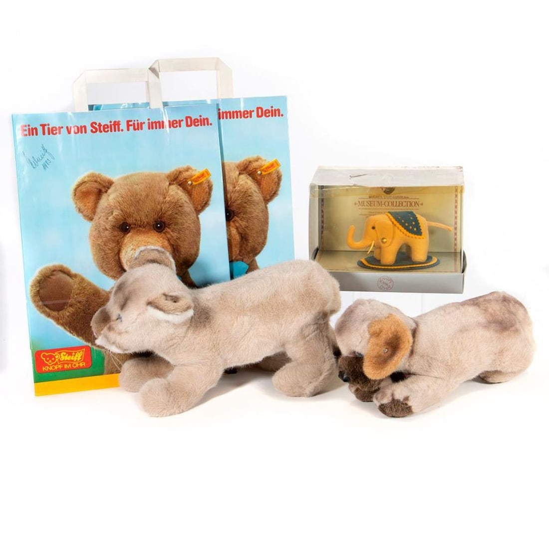 Vintage Steiff Animals, Signed bag, Catalog, Lot of 5: Lot of five vintage Steiff, a Puma cub, German Sheppard pup, and Museum Collection limited series pig. All retain original tag and button. Also included two signed bags with vintage catalog and boxes.