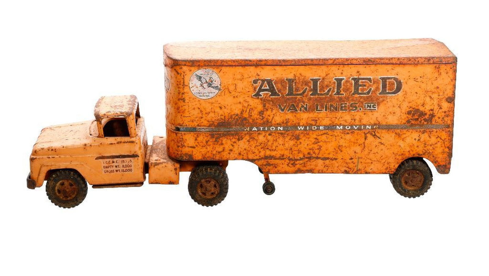 Large Tonka Van Lines Semi Truck: The orange pressed steel cab with original red paint and decals including "CFD" decal, retaining its bell and ladder, 10"h x 23"l x 10"d Condition: Poor condition, extensive loss of paint