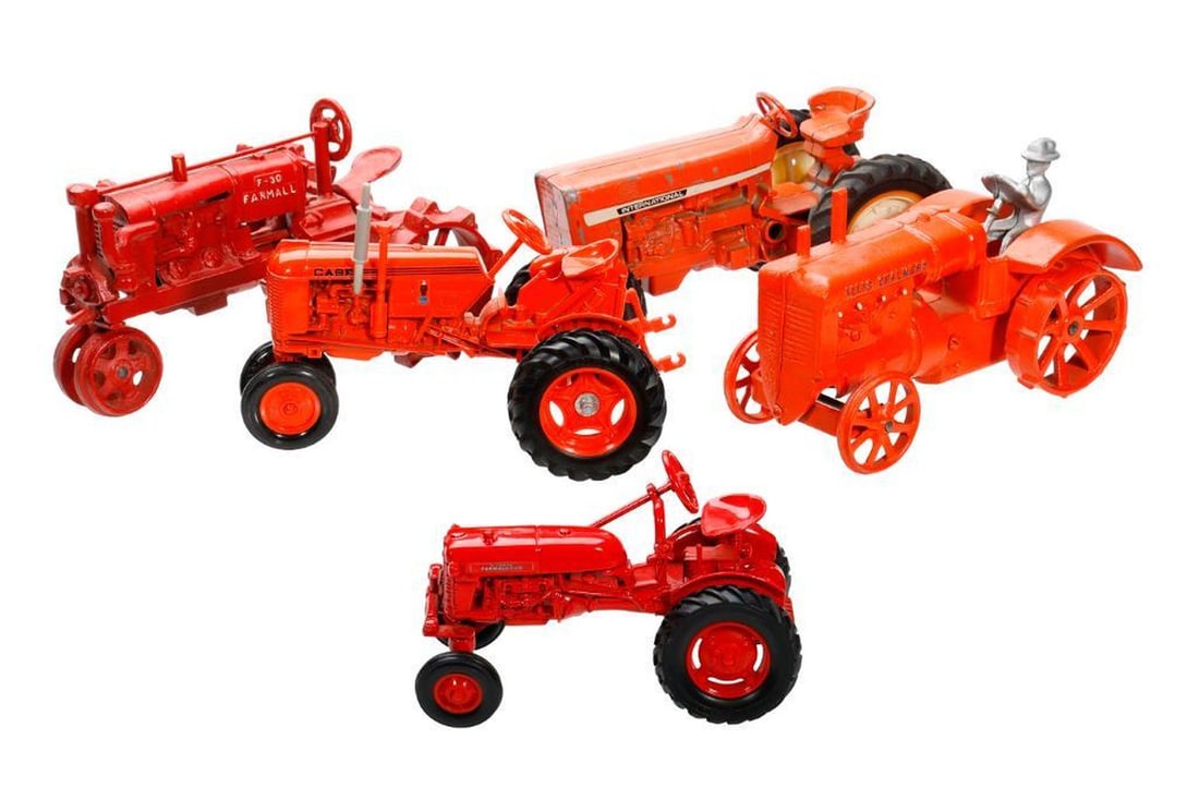 Five American Toy Tractors: Comprising (2) Farmall F-30 cast iron diecast replicas in 1:16 scale including one marked "Allis Chalmers" with a siIlvered figure; (3) Ertle tractors including a Case; McCor