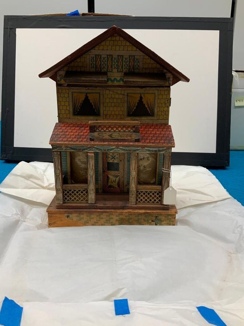 R. Bliss Doll House: A lithographed paper on wood, front facade hinged. Dimensions: 16 1/2 x 10 x 9 inches (41.9 x 25.4 x 22.9 cm) SFO Museum Deaccessioning Project SFO Museum is conducting a review and downsizing of our
