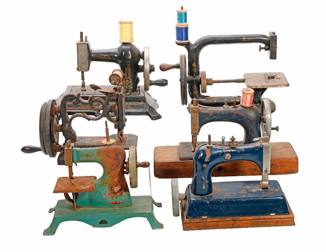 Six Miniature Sewing Machines: The largest probably German marked "M" Model No 289, 8"h x 9.5"w x 6.5"d {Paint loss to most machines in this lot, several with heavy patches of rusting}