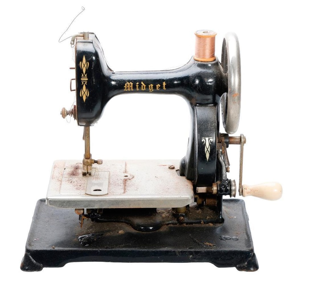 Six Vintage Miniature Sewing Machines: Including a Singer; a Stich Mistress {poor condition, losses, heavily rusted}; a German Casige miniature #1025; the largest 10"h x 10.5"w x 6"d