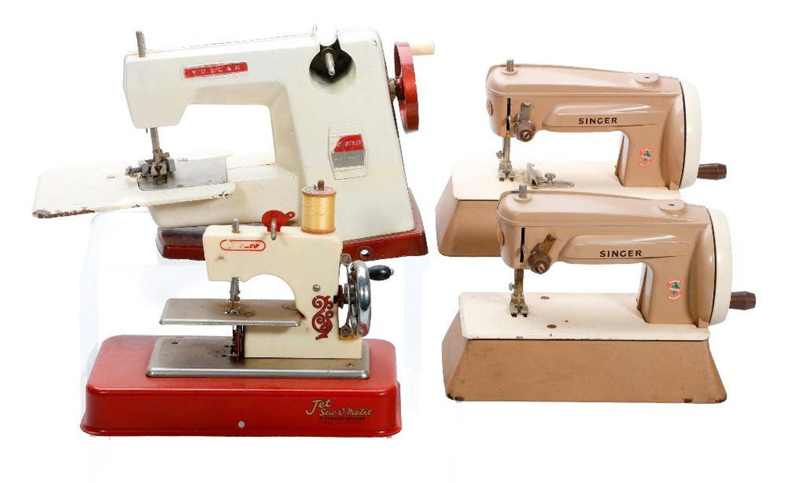 Four Mid Century Miniature Sewing Machines: Including a red and ivory Jet Sew-O-Matic model, a matching pair tan Singer miniatures and a English Vulcan miniature {warped and some rusting to the platform}, the largest 7"h x 12"w x 4.5"d