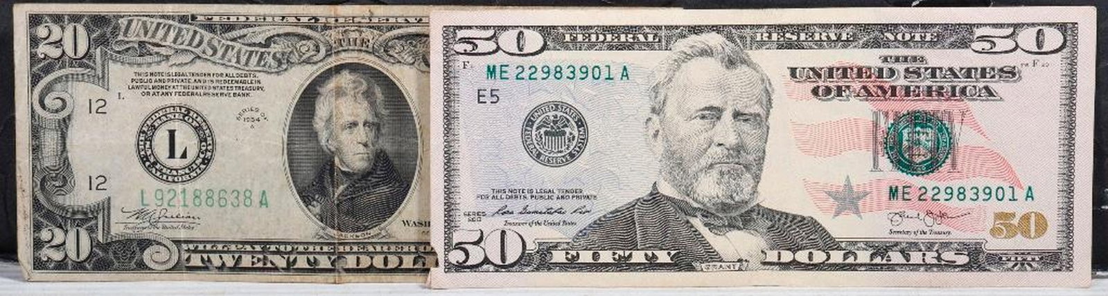 Two US Federal Reserve Notes: Comprising Series 1934 A $20 Federal Reserve Note L92188638A {wear, two folds, folded corners} and Series 2013 $50 Dollar E5 "Star" bill ME22983001A { small tear to one corner} 