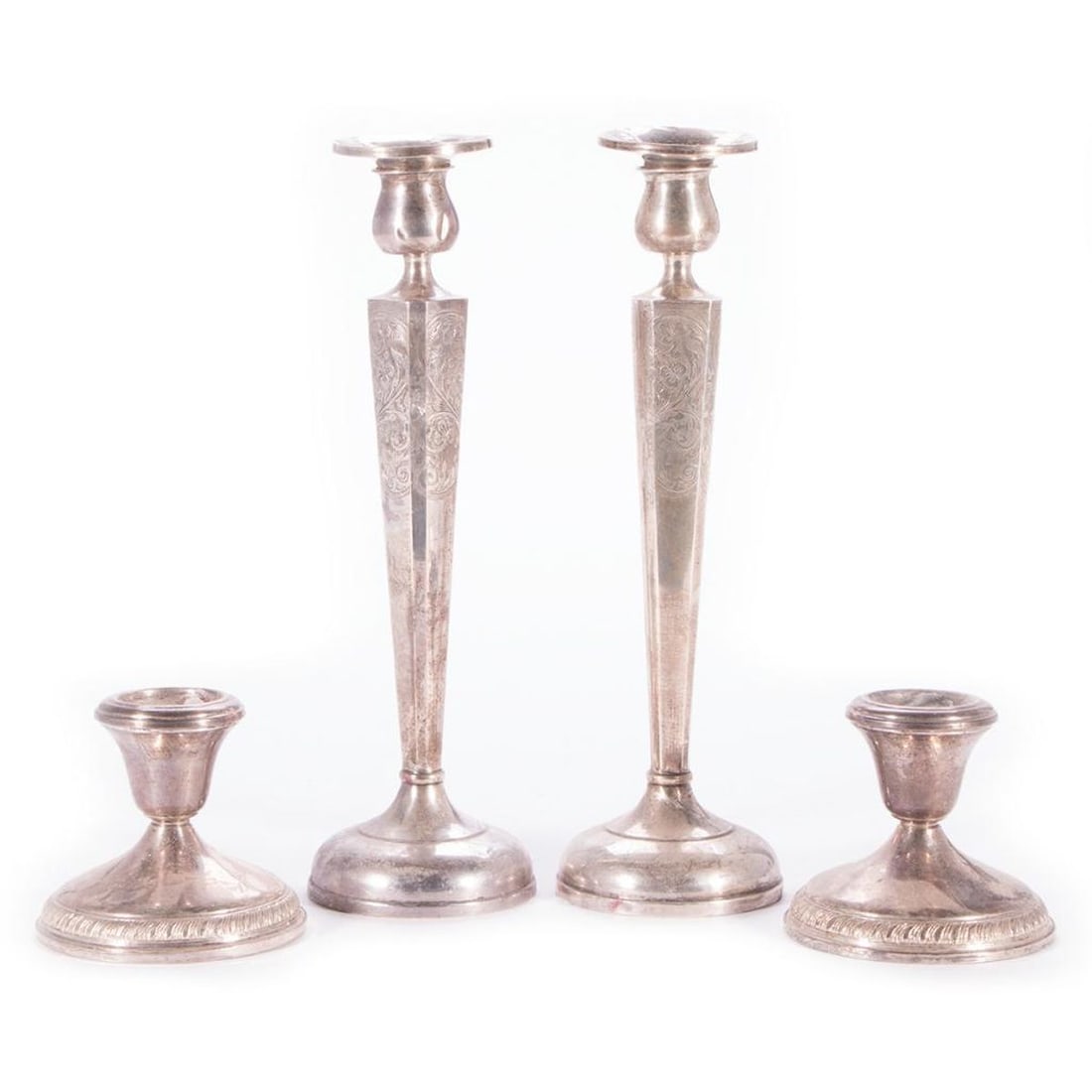 Four Sterling Weighted Candlesticks. (1 of 10)