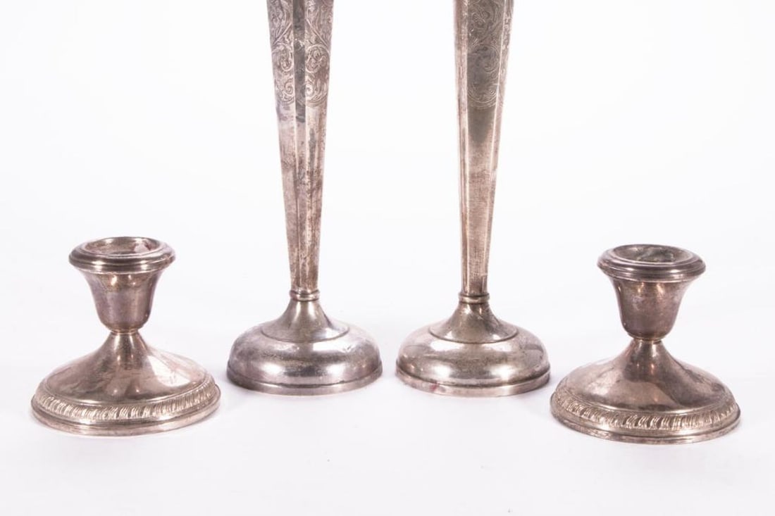 Four Sterling Weighted Candlesticks. - 4