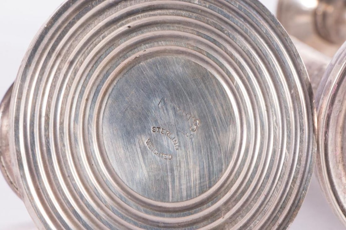 Four Sterling Weighted Candlesticks. - 8