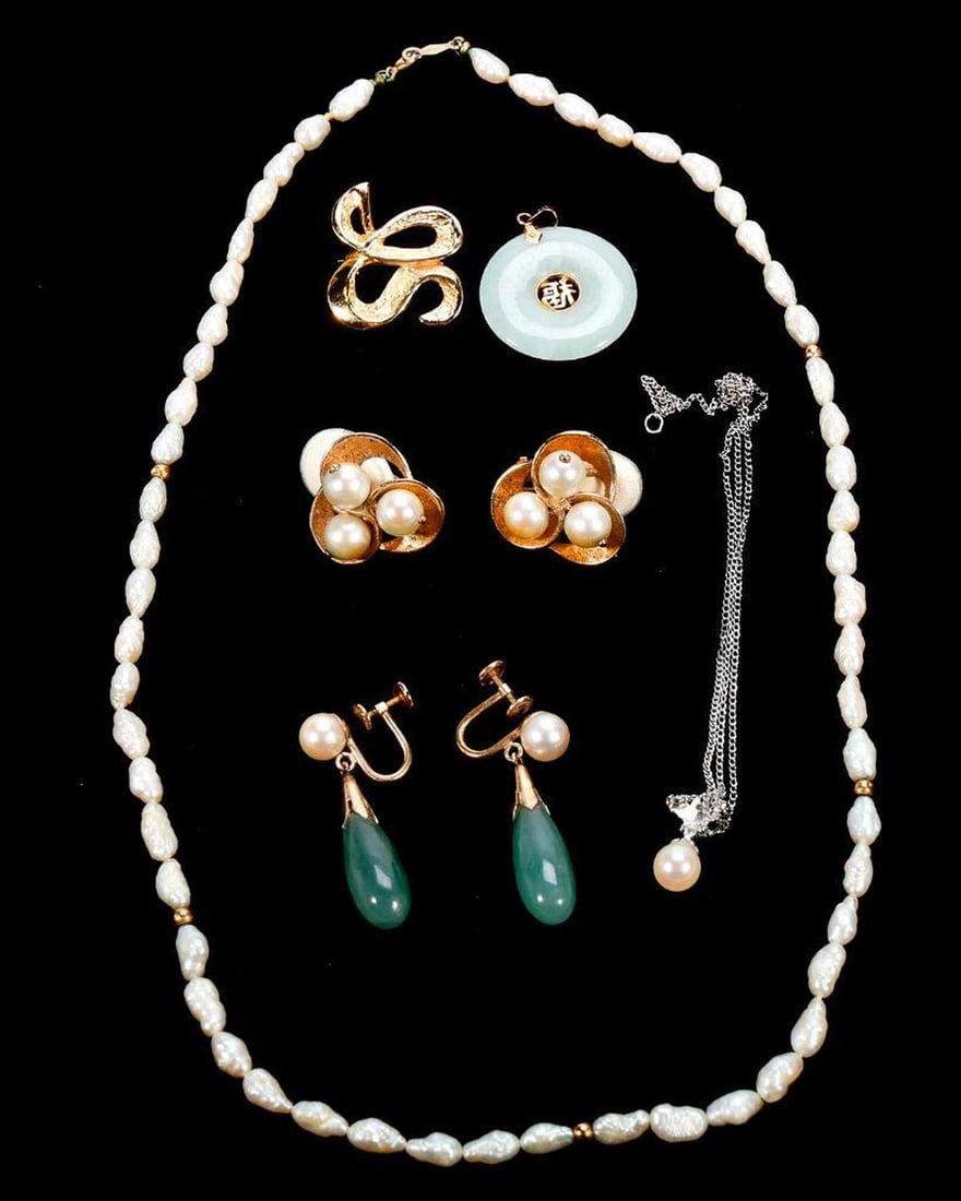 A group of cultured pearl, jade and 14k gold jewelry: including a pair of pearl clip earrings, an initial brooch, pearl and jade screw back earrings, jade pendant, freshwater pearl necklace and white gold pearl and diamond pendant-necklace