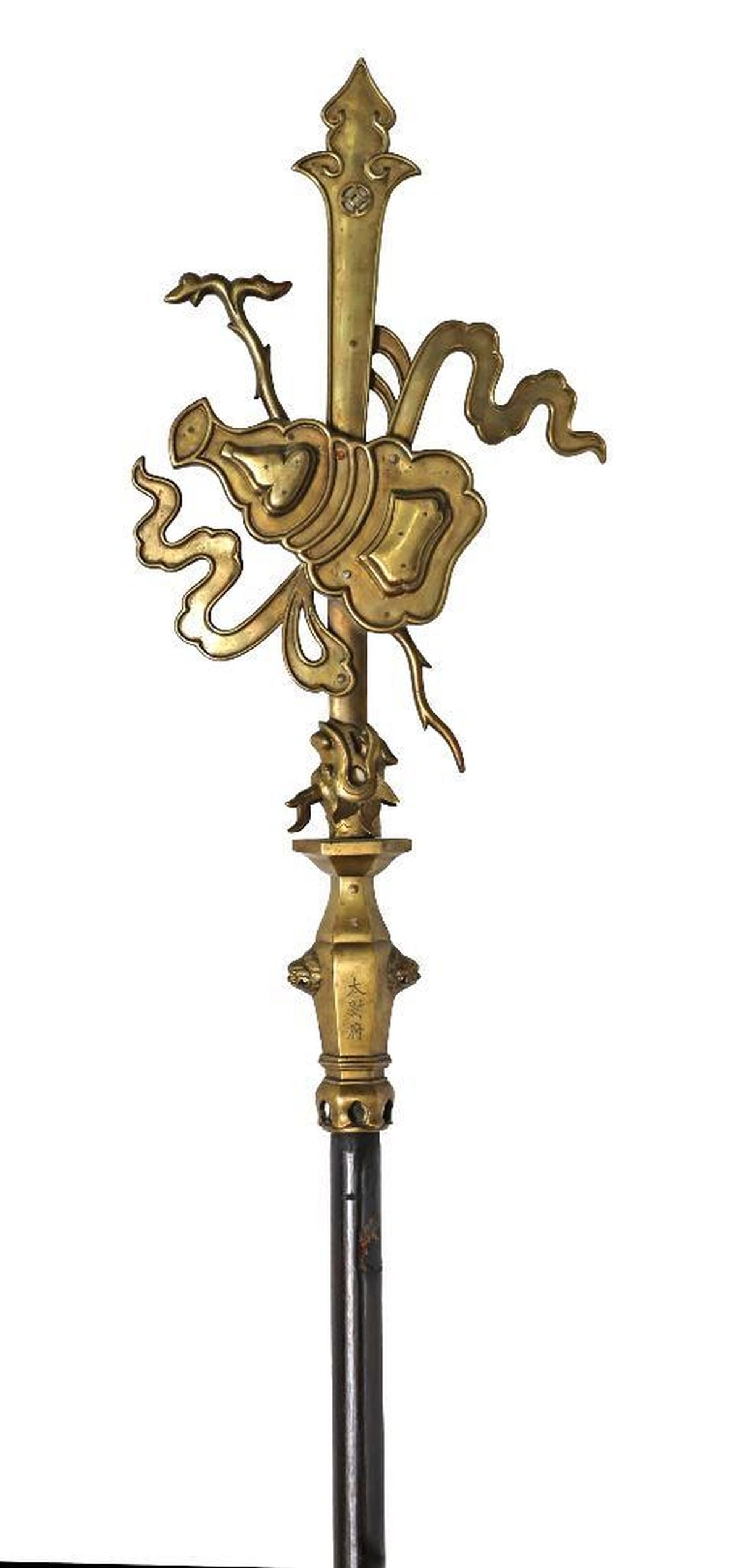 Chinese Bronze Ceremonial Polearm: The staff cast modeled horned dragon hwad at the blade base and trailing ribbons. fitted with rosewood shaft and footed stand {repaired stand}