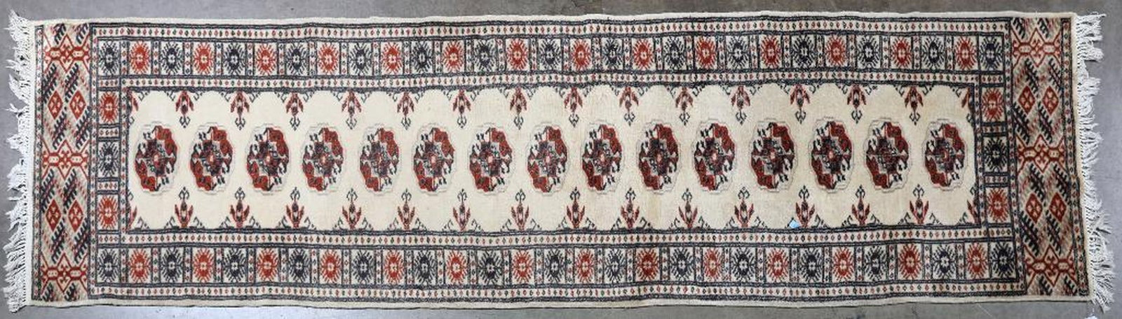 Bokhara Runner: Size approximately 10 feet 1 inch x 2 feet 7 inches