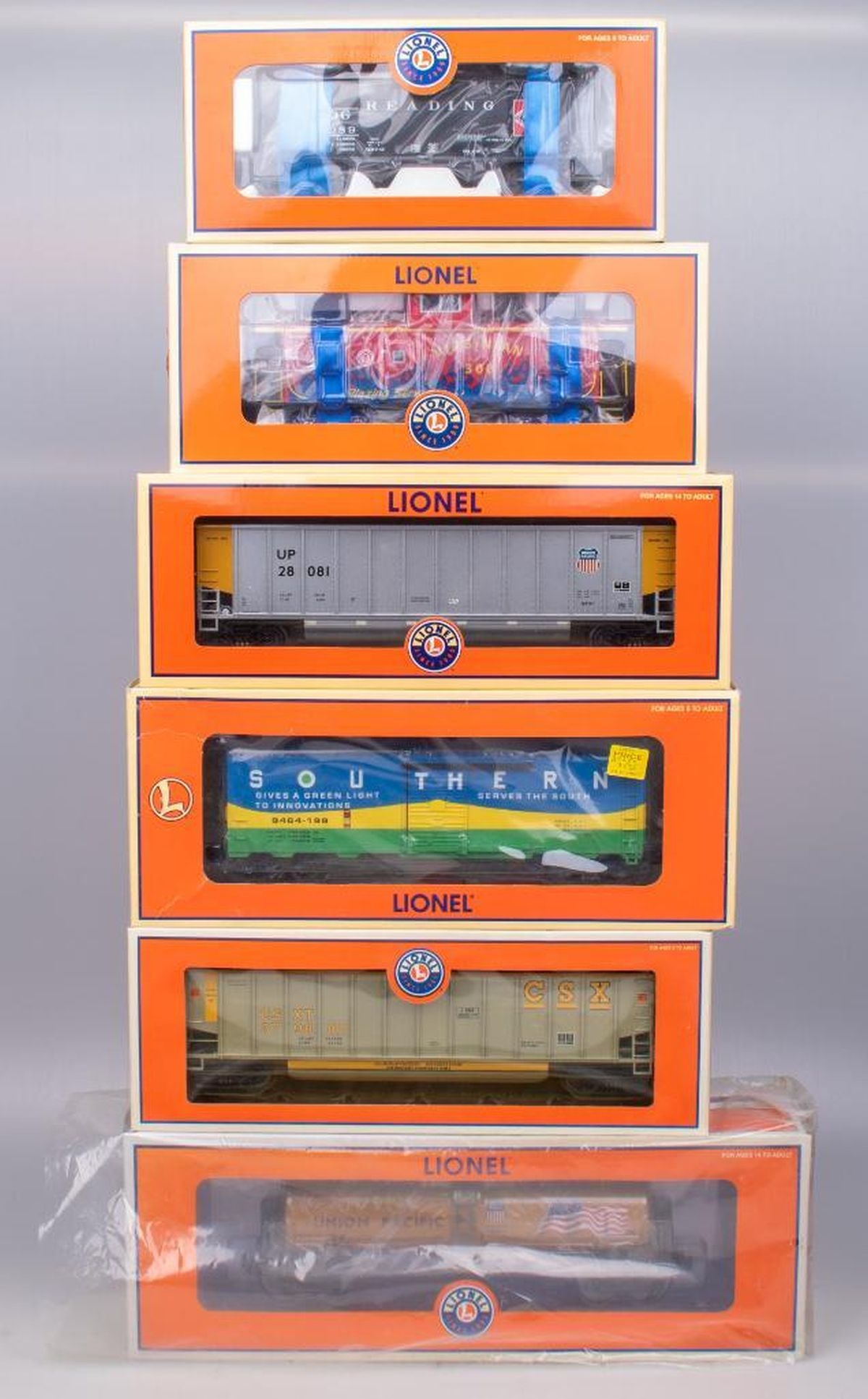 (8) Lionel O Gauge Modern Era Freight Cars: (8) Lionel O Gauge Modern Freight Cars 6-17024 Reading 50 Ton Offset Hopper (diecast). Original box. 6-17423 CSX Bathtub Gondola Car #379882. Original box. 6-27630 Virginian Heritage CA-4 Caboose. Ori