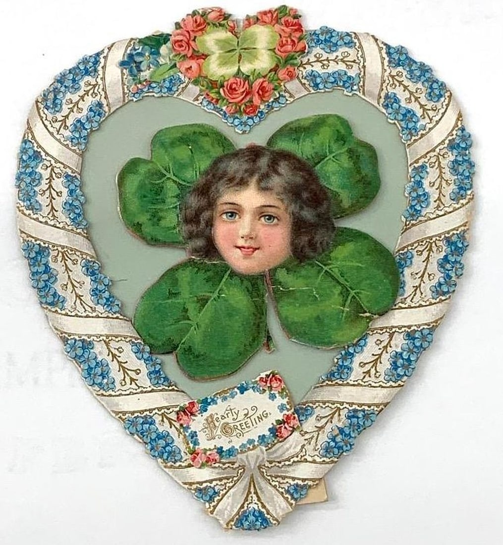 Four Vintage Heart Valentines: Group of four circa 1880s to 1920s heart Valentines: 1.) Vintage Valentine card with heart shaped silver open floral pattern, ivory doily with pansies in center. Dimensions: 5 1/4 x 5 1/4 inches;