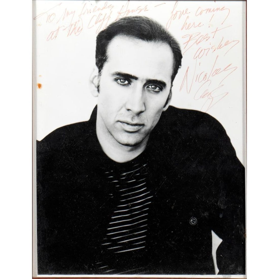 Two Photos Signed to the Cliff House, Nicolas Cage and Tomas Arana: Two original autographed publicity photographs for the Cliff House: NICOLAS CAGE (b. 1964), inscribed: "To my friends at The Cliff House / Love coming here! Best Wishes, Nicolas Cage." And, 