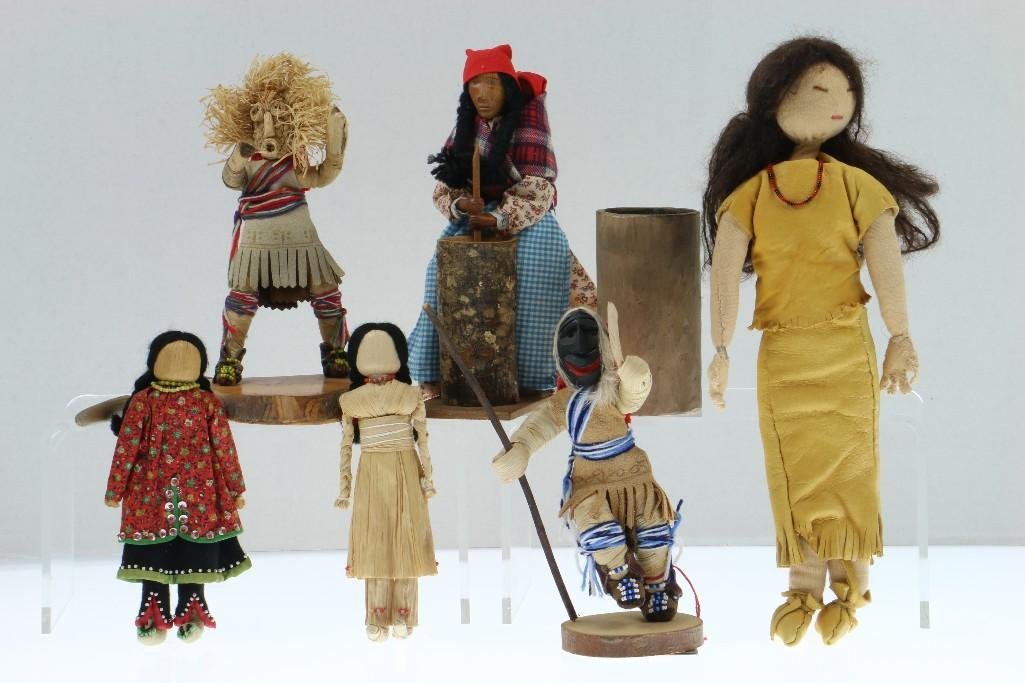 Six Native American dolls: Including two Iroquois masked examples, and a separate model mortar and pesto. Turner Auctions + Appraisals is pleased to present basketry and other items from Native American and other indigenous cul