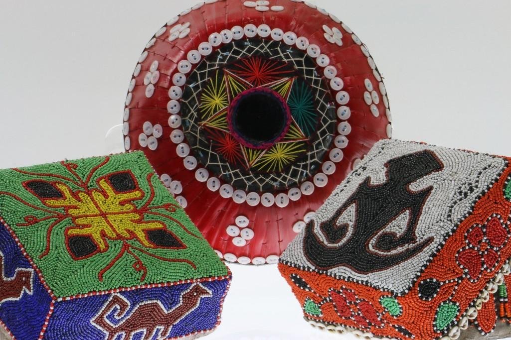 Three Indonesian containers: Including two beaded lidded boxes and a bowl. Turner Auctions + Appraisals is pleased to present basketry and other items from Native American and other indigenous cultures from the private collection