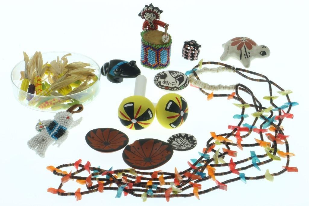 Collection of Southwest items: Zuni beadwork, Santo Domingo fetish necklace, frog effigy, Hopi miniature rattles, pottery vessels and more. Turner Auctions + Appraisals is pleased to present basketry and other items from Native Ame