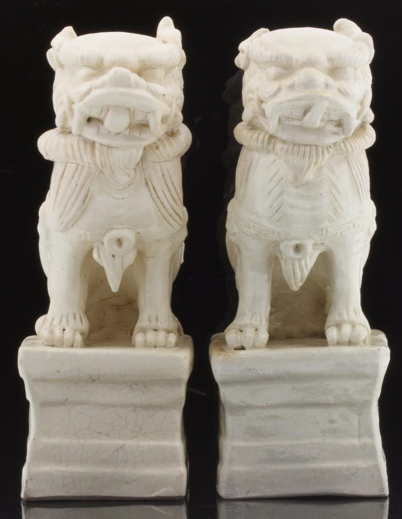 TWO 19TH CENTURY STYLE CHINESE POTTERY FOO DOGS: Height: 11 inches