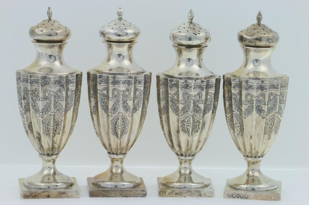 FOUR GEORGE III STERLING SILVER CASTERS: By Richard Crosley & George Smith IV Height: 7 inches