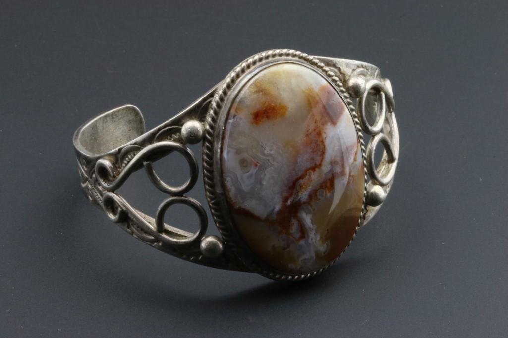 Navajo bracelet: End to end approximately 6 inches Gap: 1/2 of an inch Widest point: 1 1/2 inches Additional Description: From the Estate of Margaret Taylor, Sedona, Arizona Margaret Taylor was a teacher for many year