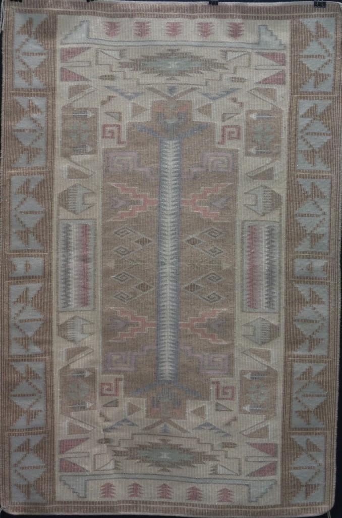 Navajo Teec Nos Pos-style raised outline rug: 55 1/2 x 36 1/2 inches Additional Description: From the Estate of Margaret Taylor, Sedona, Arizona Margaret Taylor was a teacher for many years near the Hopi and Navajo reservations around Flagstaff,