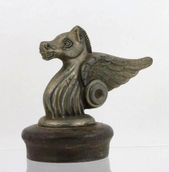 EICAR MASCOT, 1930: Height: 3 1/4 inches Sy and Ronnie Margolis's eclectic collection features a wide range of hood or fender ornaments, from about 1909 to recent times. Most date from the 1920s and 1930s, with many from