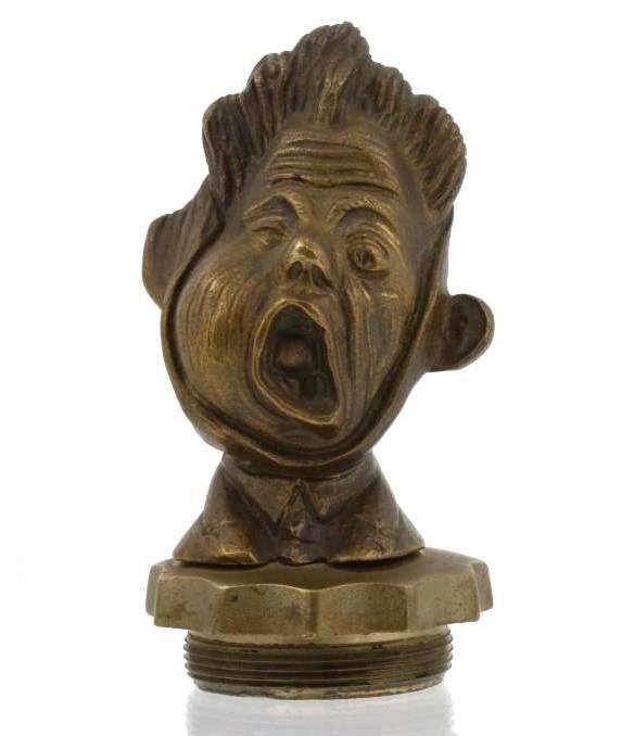 'TOOTH ACHE" FRENCH DENTAL ASSOCIATION MASCOT, 1920: Height: 5 1/4 inches Sy and Ronnie Margolis's eclectic collection features a wide range of hood or fender ornaments, from about 1909 to recent times. Most date from the 1920s and 1930s, with many from