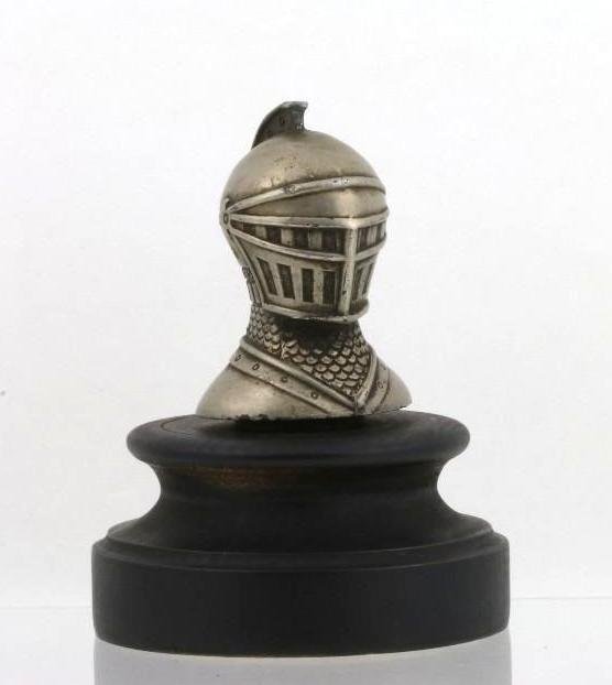 WILLYS-KNIGHT MASCOT, 1923-26: Height: 4 inches Sy and Ronnie Margolis's eclectic collection features a wide range of hood or fender ornaments, from about 1909 to recent times. Most date from the 1920s and 1930s, with many from the