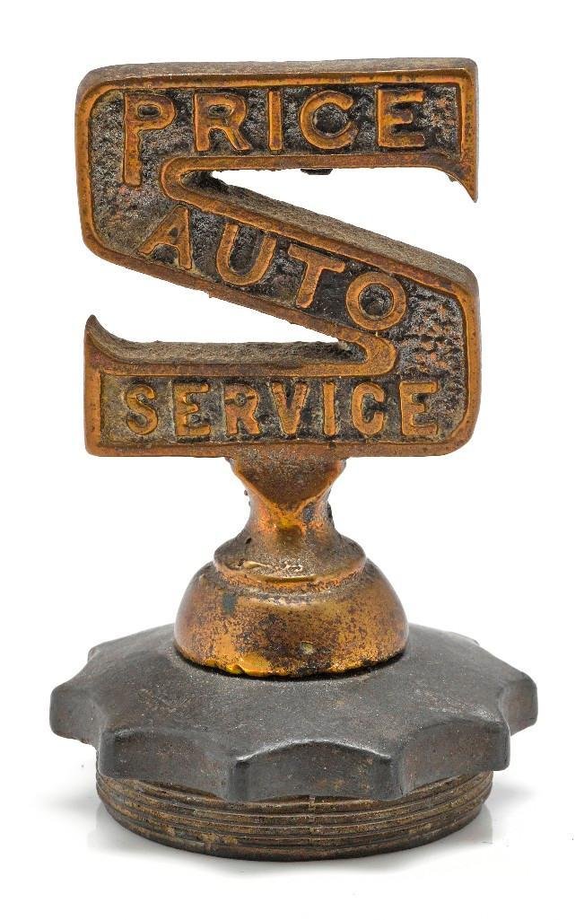 PRICE AUTO SERVICE MASCOT: Height: 4 inches Sy and Ronnie Margolis's eclectic collection features a wide range of hood or fender ornaments, from about 1909 to recent times. Most date from the 1920s and 1930s, with many from the