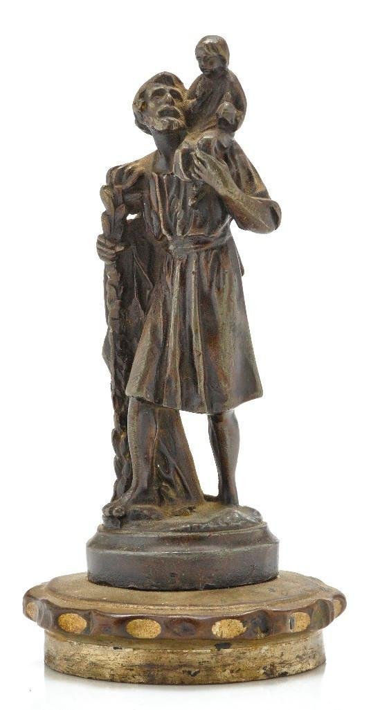 THREE ST. CHRISTOPHER MASCOTS, TWO FROM THE 1920'S: Figurine height: 6 1/4 inches Badge height: 7 1/2 inches Moto-Meter height: 3 1/2 inches Sy and Ronnie Margolis's eclectic collection features a wide range of hood or fender ornaments, from about 1909