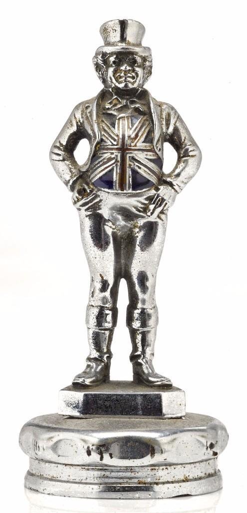 ENGLISH GENTLEMAN WITH CLOSINE VEST MASCOT: Height: 5 3/4 inches Sy and Ronnie Margolis's eclectic collection features a wide range of hood or fender ornaments, from about 1909 to recent times. Most date from the 1920s and 1930s, with many from
