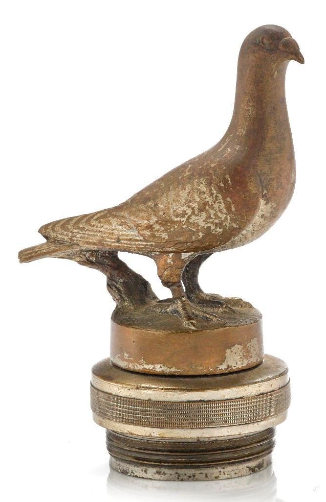 HOMING PIGEON BY P. QUINTIN: Engraved signature on base Height: 5 1/4 inches Sy and Ronnie Margolis's eclectic collection features a wide range of hood or fender ornaments, from about 1909 to recent times. Most date from the 1920
