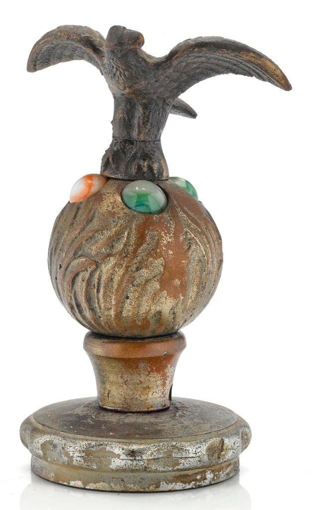 ILLUMINATED AMERICAN ACCESSORY MASCOT: Height: 6 inches Sy and Ronnie Margolis's eclectic collection features a wide range of hood or fender ornaments, from about 1909 to recent times. Most date from the 1920s and 1930s, with many from the