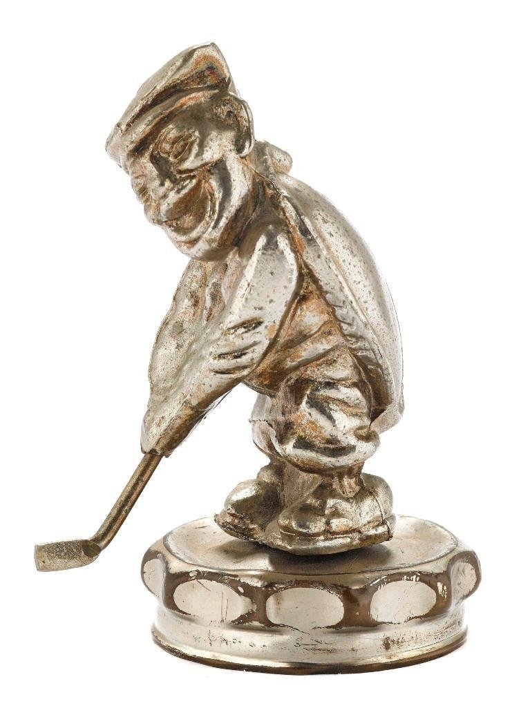 GOLFING BEETLE MASCOT BY DU DWYER, BRITISH, CIRCA 1922: Height: 5 inches Sy and Ronnie Margolis's eclectic collection features a wide range of hood or fender ornaments, from about 1909 to recent times. Most date from the 1920s and 1930s, with many from the