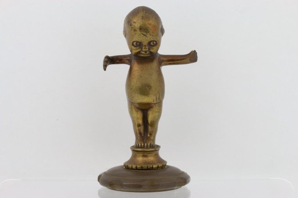 CUPIE MASCOT BY H PAGEN: Signature on base Height: 6 inches Sy and Ronnie Margolis's eclectic collection features a wide range of hood or fender ornaments, from about 1909 to recent times. Most date from the 1920s and 1930s, 