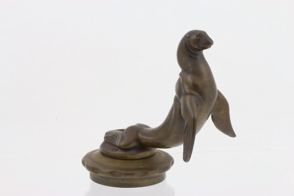 SEAL MASCOT BY FRECOURT, FRENCH: Height: 4 1/4 inches Sy and Ronnie Margolis's eclectic collection features a wide range of hood or fender ornaments, from about 1909 to recent times. Most date from the 1920s and 1930s, with many from