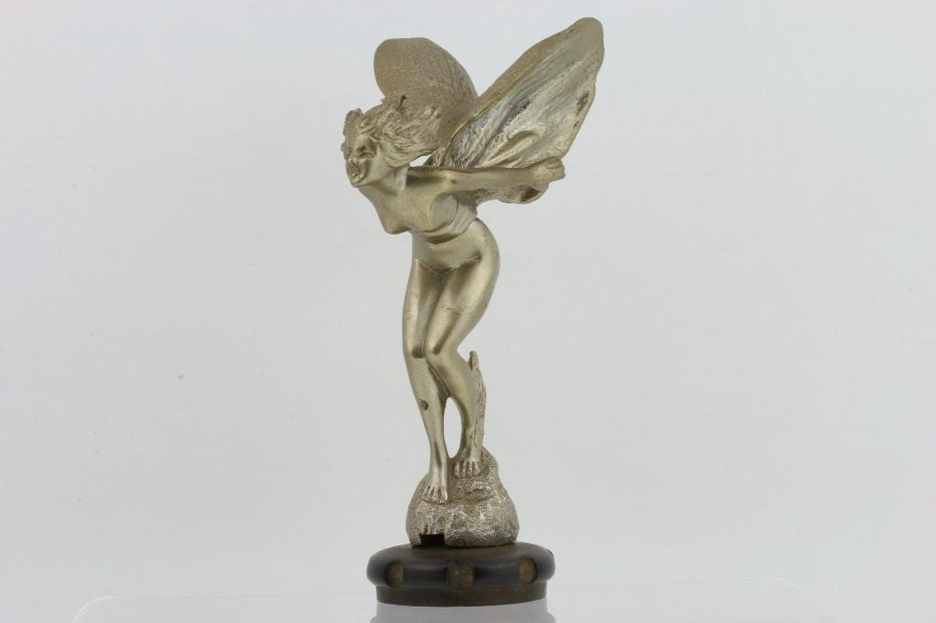 PAPALLION F. 1920: Height: 7 1/2 inches Sy and Ronnie Margolis's eclectic collection features a wide range of hood or fender ornaments, from about 1909 to recent times. Most date from the 1920s and 1930s, with many from