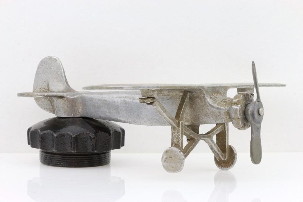 SPIRIT OF ST. LOUIS PLANE MASCOT OF LINDBERGH'S FLIGHT: Details of flight engraved on top of plane. Length: 7 1/4 inches Sy and Ronnie Margolis's eclectic collection features a wide range of hood or fender ornaments, from about 1909 to recent times. Most d
