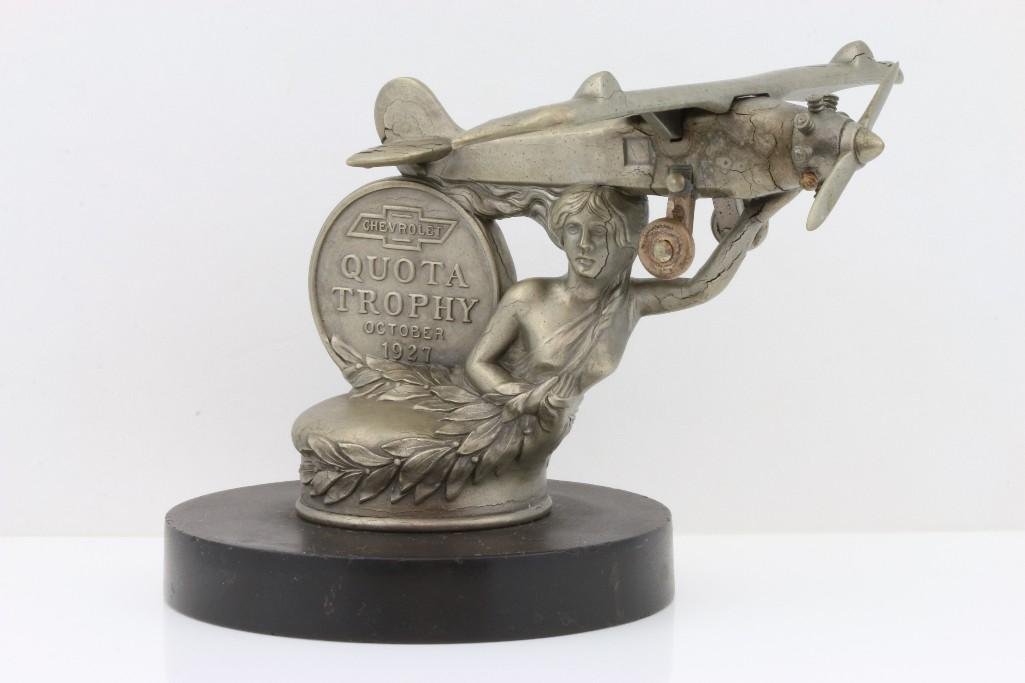 CHEVROLET QUOTA TROPHY, OCTOBER 1927: Length of mascot: 6 inches Sy and Ronnie Margolis's eclectic collection features a wide range of hood or fender ornaments, from about 1909 to recent times. Most date from the 1920s and 1930s, with man