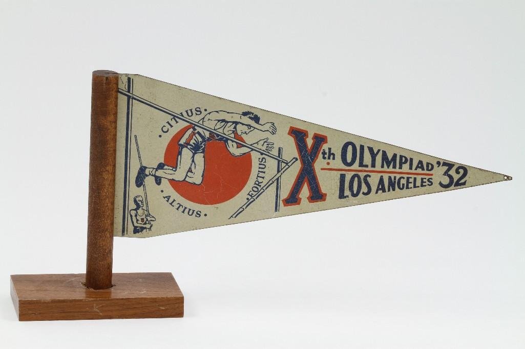 1932 LOS ANGELES OLYMPIC FLAG: Length: 10 inches Note: The sale features 110 lots related to the 1932 Olympics in Los Angeles, including car mascots, radiator badges, license plates, banners, maps, pennants, booklets, tickets and e
