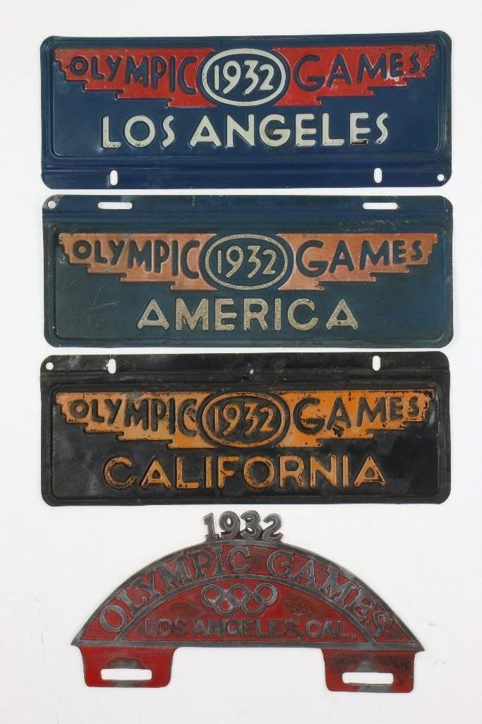 1932 OLYMPICS LICENSE PLATE TOPPER AND 3 LICENSE PLATES: Four total, worn License plates: 4 1/2 X 12 inches Original Topper: approximately 5 x 10 inches Note: The sale features 110 lots related to the 1932 Olympics in Los Angeles, including car mascot