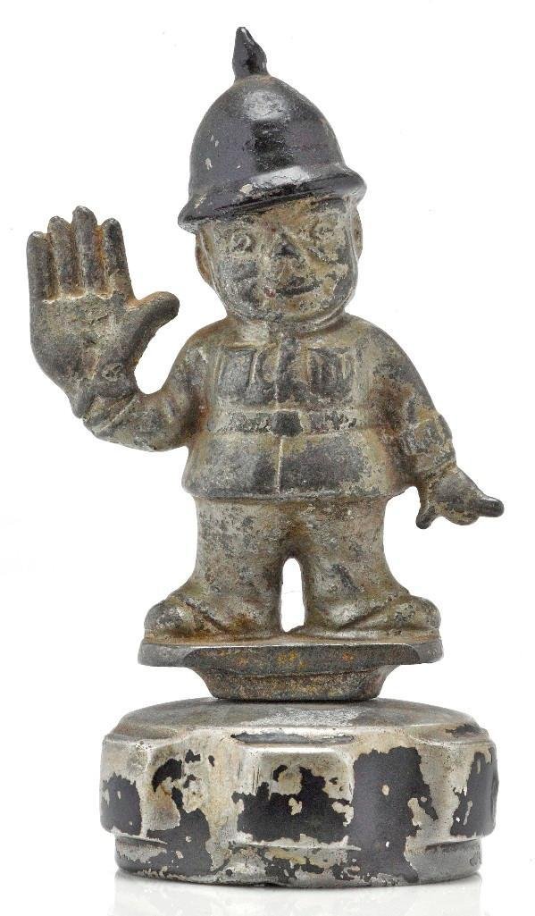 BRITISH BOBBY MASCOT WITH PAINTED HAT: Height: 6 inches Note: The sale features 110 lots related to the 1932 Olympics in Los Angeles, including car mascots, radiator badges, license plates, banners, maps, pennants, booklets, tickets and ep